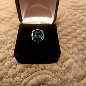 London Blue topaz ring with diamond halo set in silver